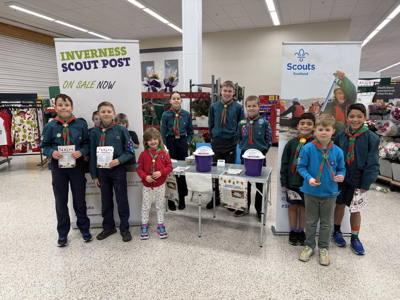 Scouts and Cubs at the Scout Post stamp stall in Tesco Inshes